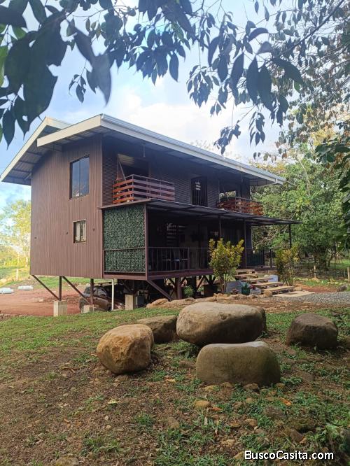 SE VENDE BELLA PROPIEDAD Y CABAÑA EN LA PALMERA DE SAN CARLOS. 