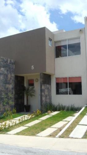 Residencia a espaldas de Club de golf