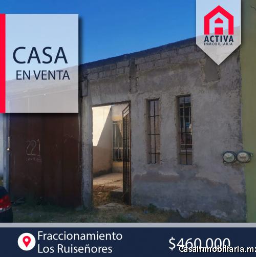 Casa con barda y portón en Los Ruiseñores