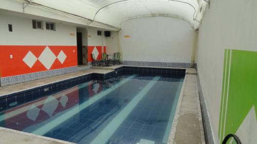 VENDO CASA EN UNA CIUDADELA DE OTAVALO