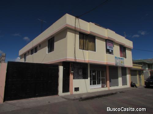 Casa en el centro de la ciudad con departamentos, cuartos y locales arrendados