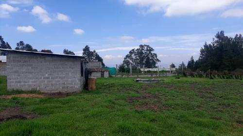 PINTAG, vendo propiedad de 2600m2 de terreno y 110m2 de construcción, sector San Carlos